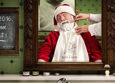 Photographe publicitaire : portrait photo du père Noël chez le barbier